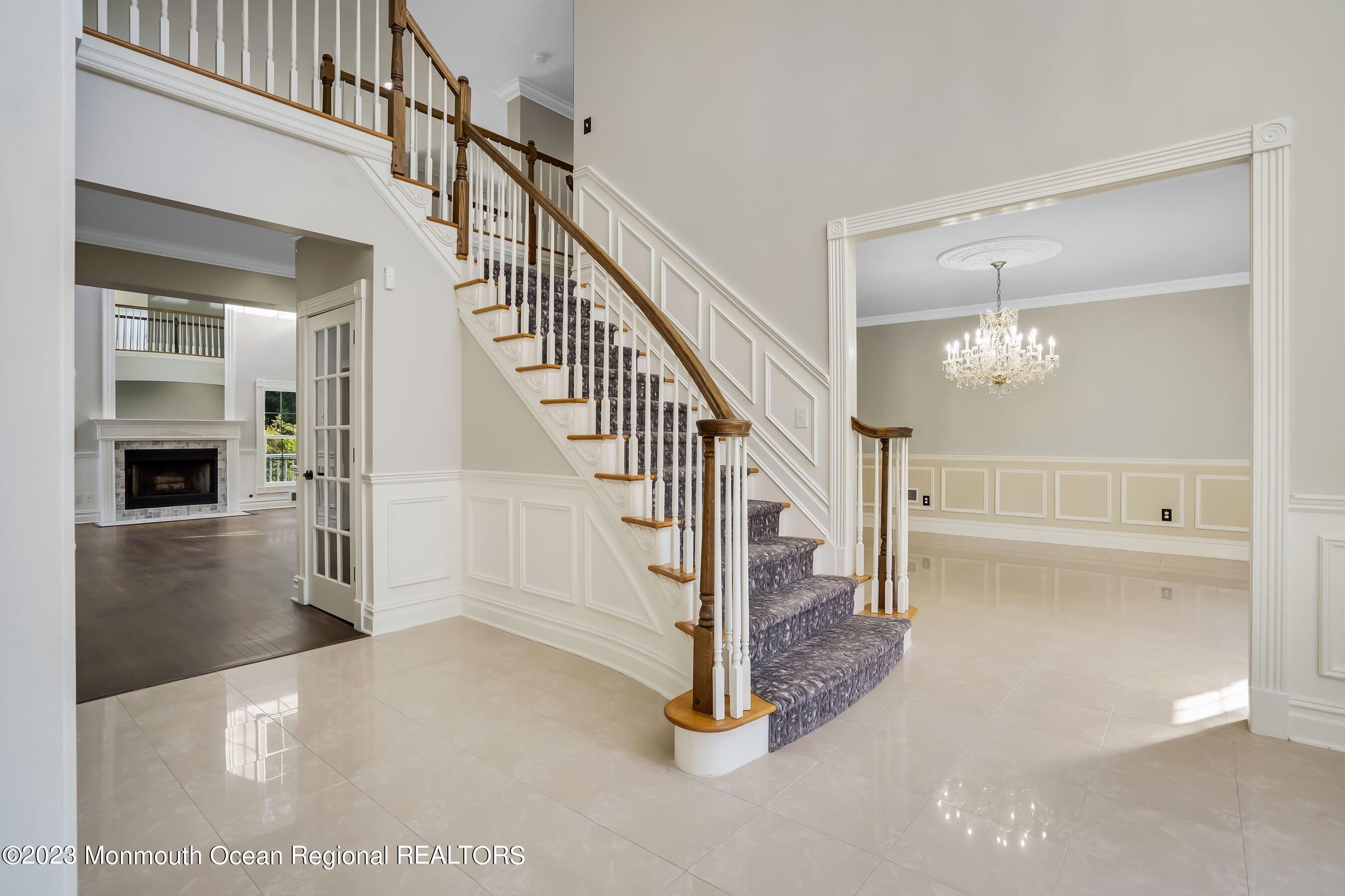 3 Copperleaf Lane Colts Neck, NJ 07722 - Photo 6 of 47 a view of a hallway with staircase