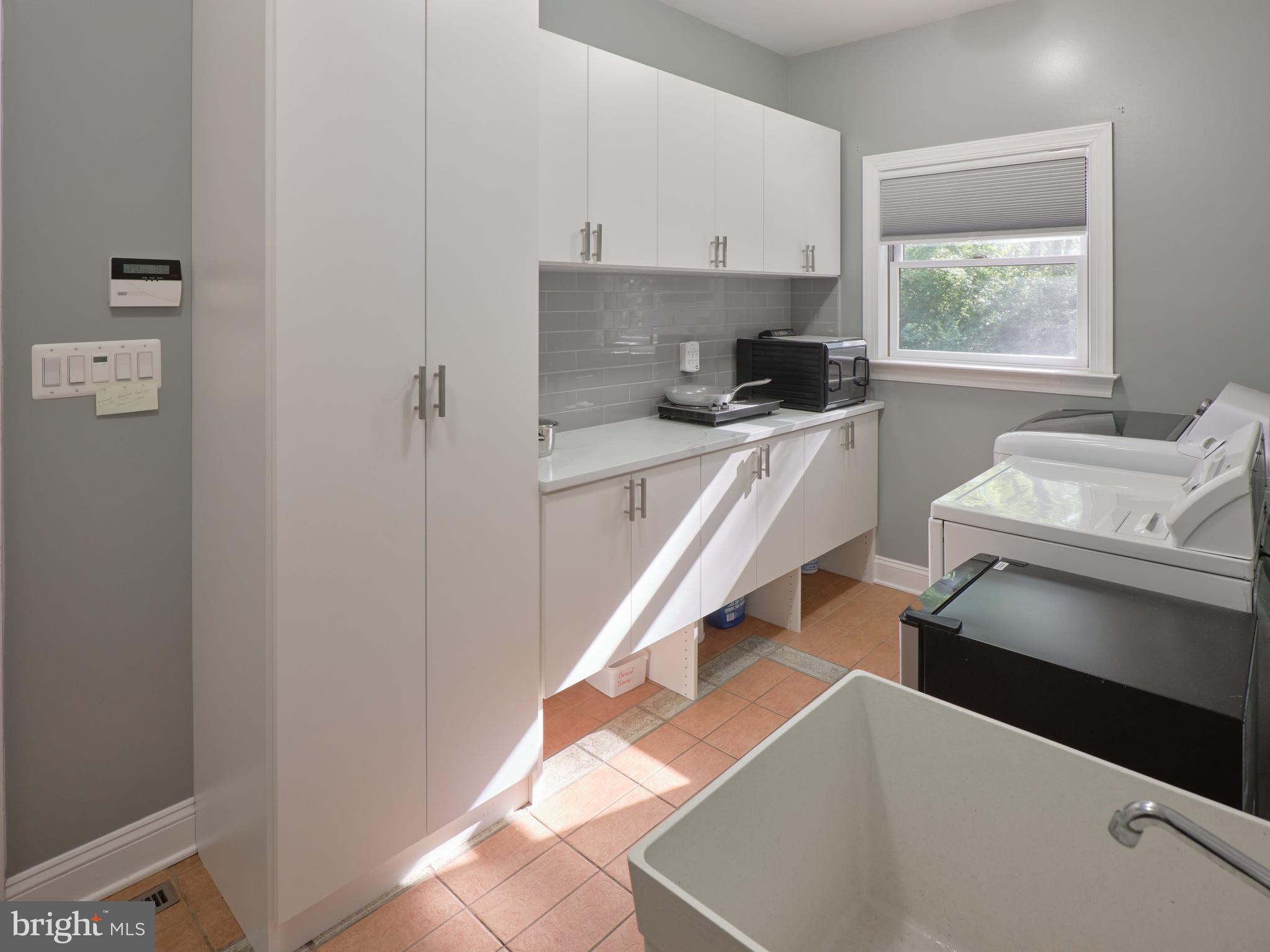 6025 Upper Mountain Road New Hope, PA 18938 - Photo 21 of 51 Bonus Kitchen w/Built-in Cabinet Space and Laundry
