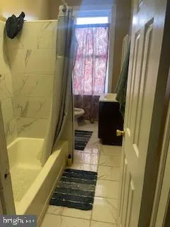 a bathroom with a bathtub