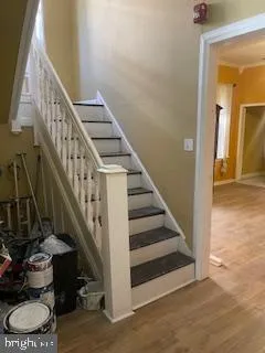 a view of entryway with wooden floor