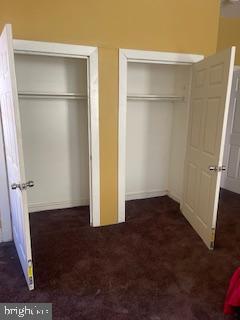 4623 Pulaski Avenue Philadelphia, PA 19144 - Photo 10 of 20 an empty room with wooden door and a wooden floor
