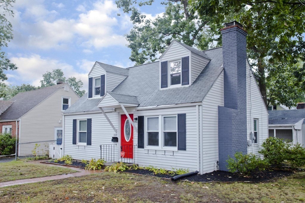 228 Shawmut Street Springfield, MA 01108 - Photo 1 of 39 a front view of a house with a yard