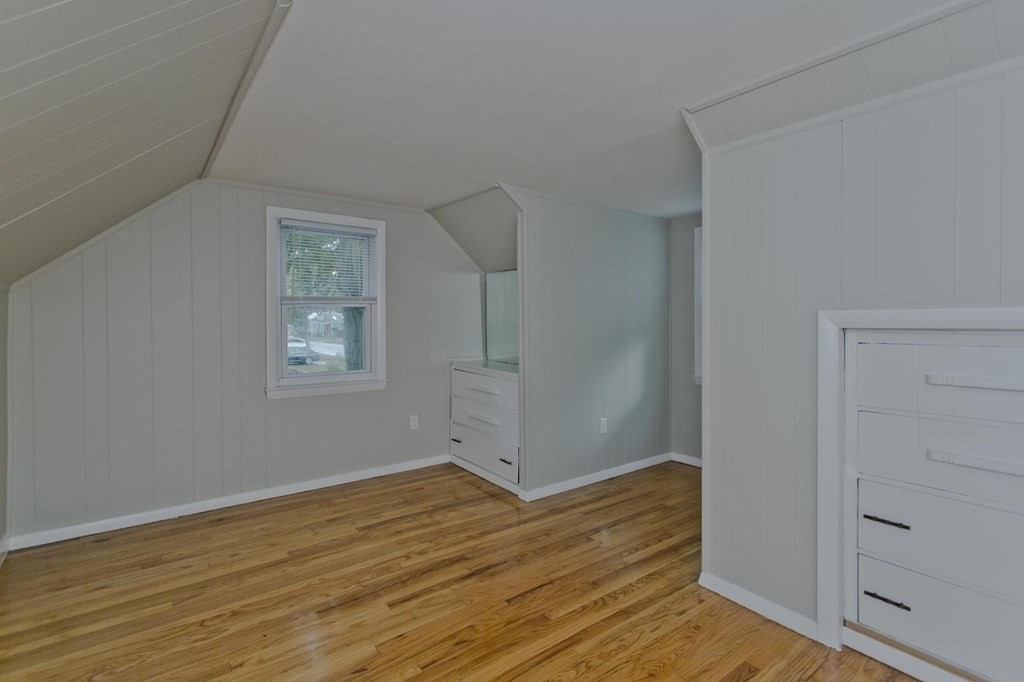 228 Shawmut Street Springfield, MA 01108 - Photo 20 of 39 a view of room with window and wooden floor