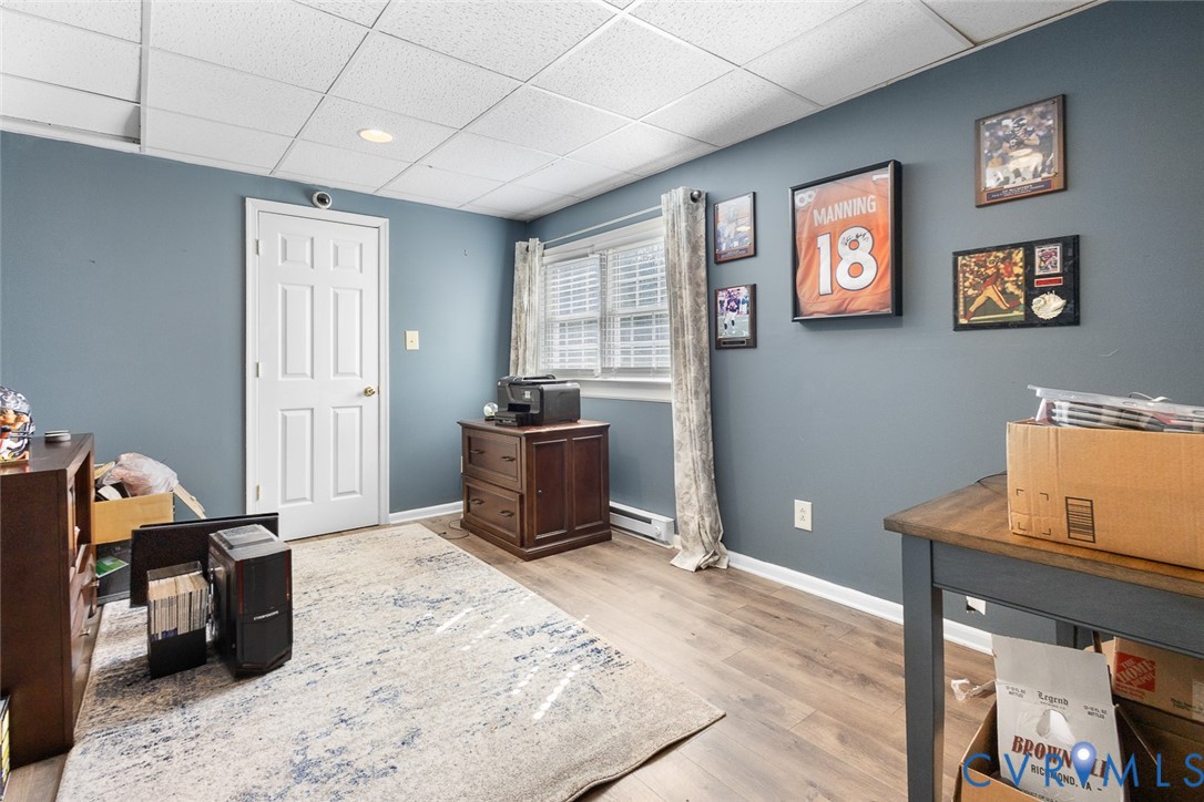212 Copper Line Road Bumpass, VA 23024 - Photo 21 of 35 a bedroom with furniture and a window