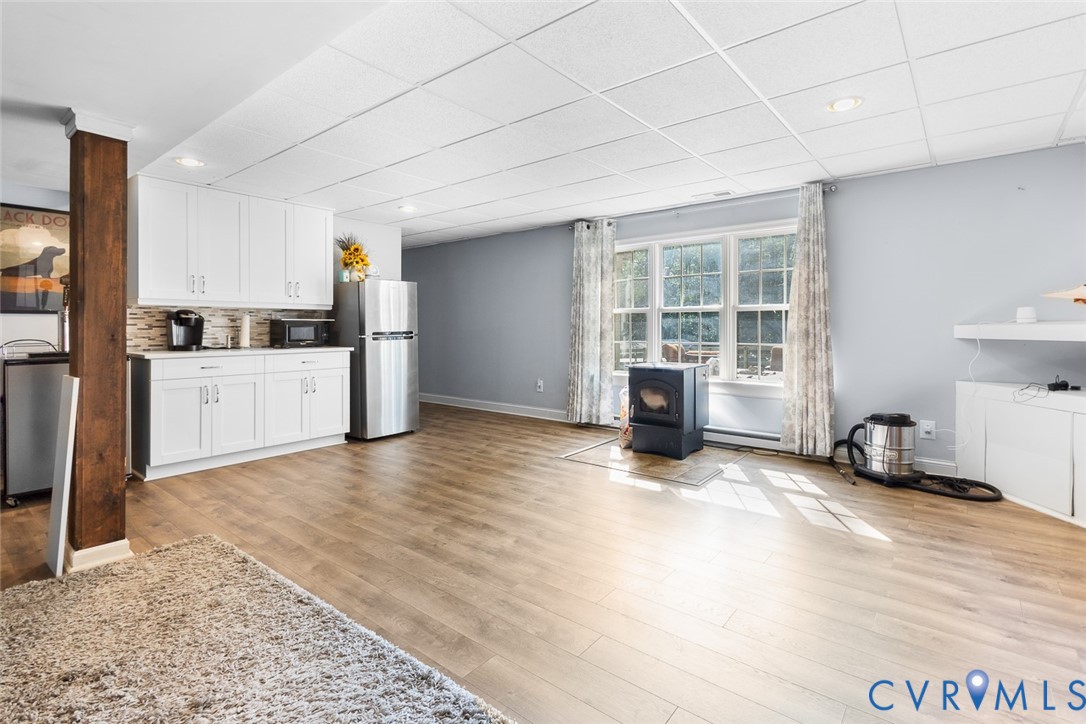 212 Copper Line Road Bumpass, VA 23024 - Photo 24 of 35 a view of a kitchen with a sink and dishwasher cabinets
