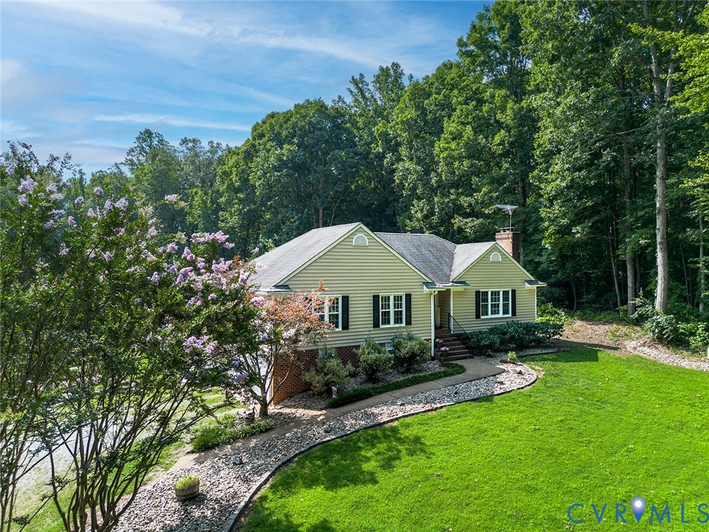 212 Copper Line Road Bumpass, VA 23024 - Photo 35 of 35 a front view of a house with yard and green space