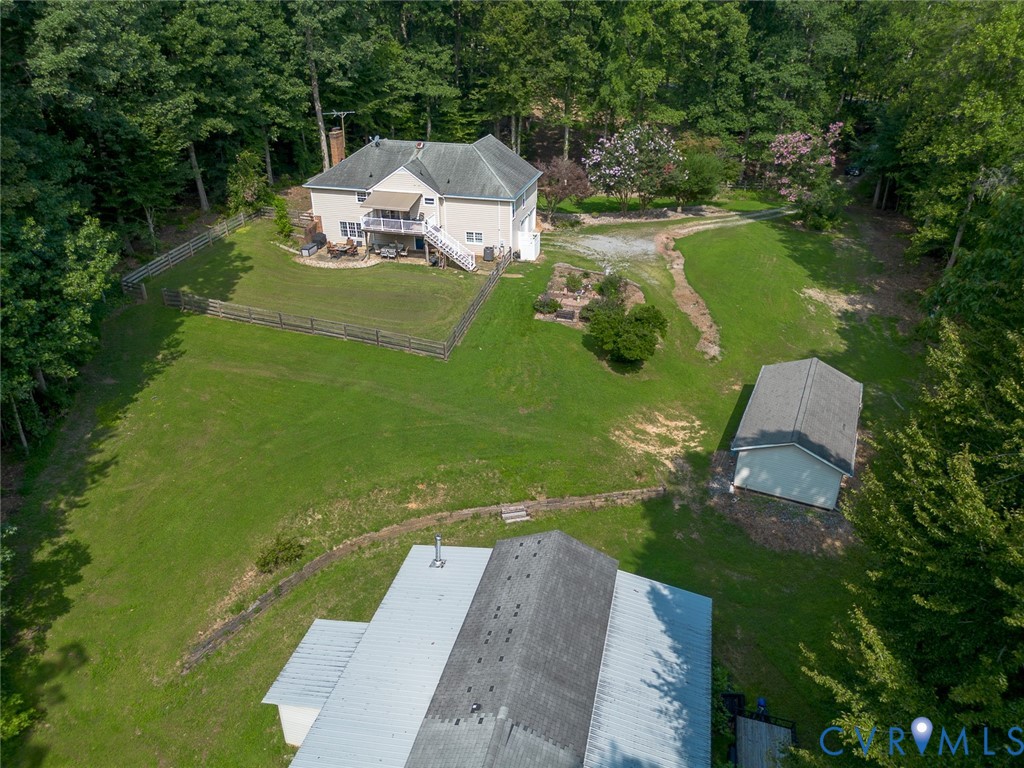 212 Copper Line Road Bumpass, VA 23024 - Photo 4 of 35 an aerial view of a house with a yard