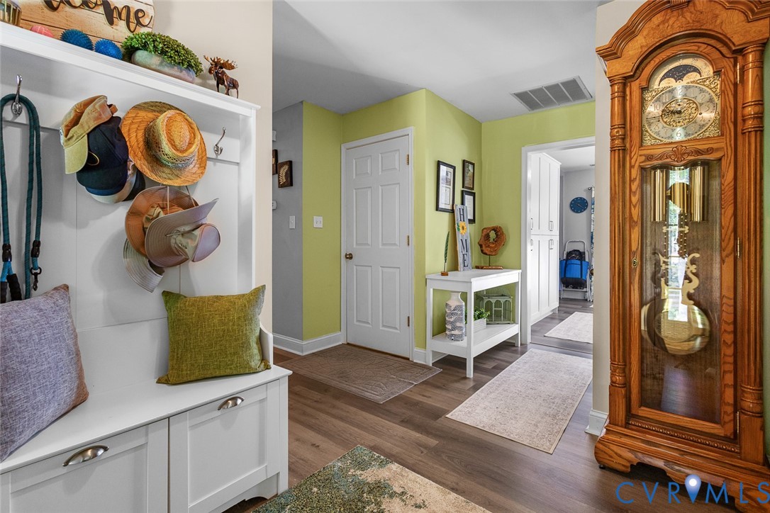 212 Copper Line Road Bumpass, VA 23024 - Photo 6 of 35 a view of an entryway with wooden floor