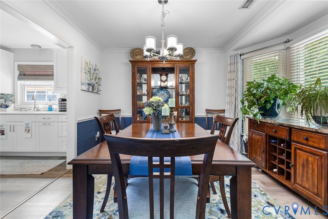 212 Copper Line Road Bumpass, VA 23024 - Photo 10 of 35 a view of a dining room with furniture window and wooden floor