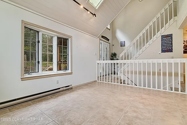 a view of an entryway with a staircase