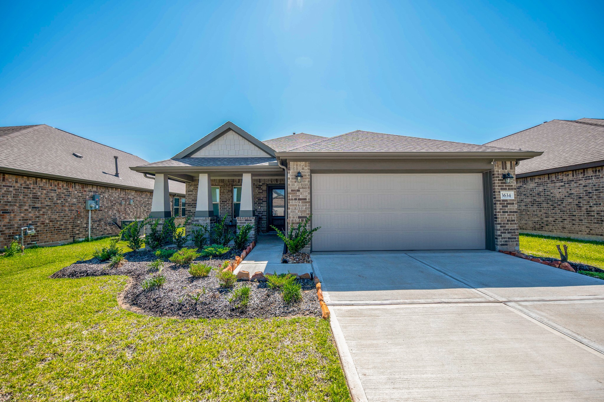 3634 Homestead Ridge Lane Richmond, TX 77406 - Photo 2 of 32 a front view of house with yard and outdoor seating