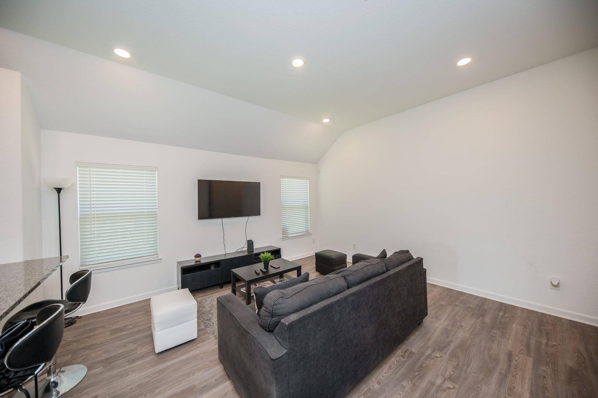 3634 Homestead Ridge Lane Richmond, TX 77406 - Photo 6 of 32 a living room with furniture and a flat screen tv
