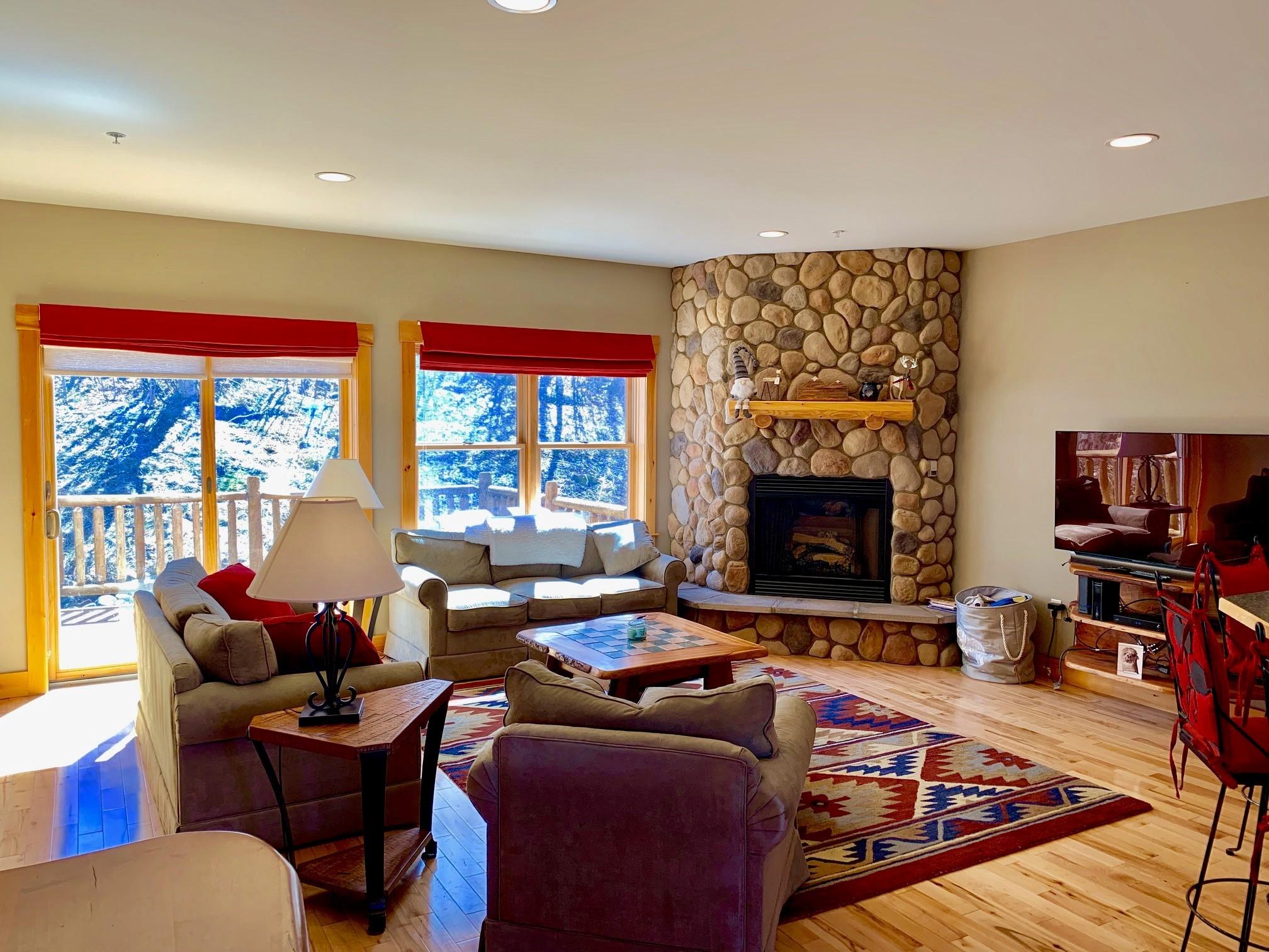 7011 Hardwood Ridge Road, Unit 7011 Carrabassett Valley, ME 04947 - Photo 2 of 17 Living room 4