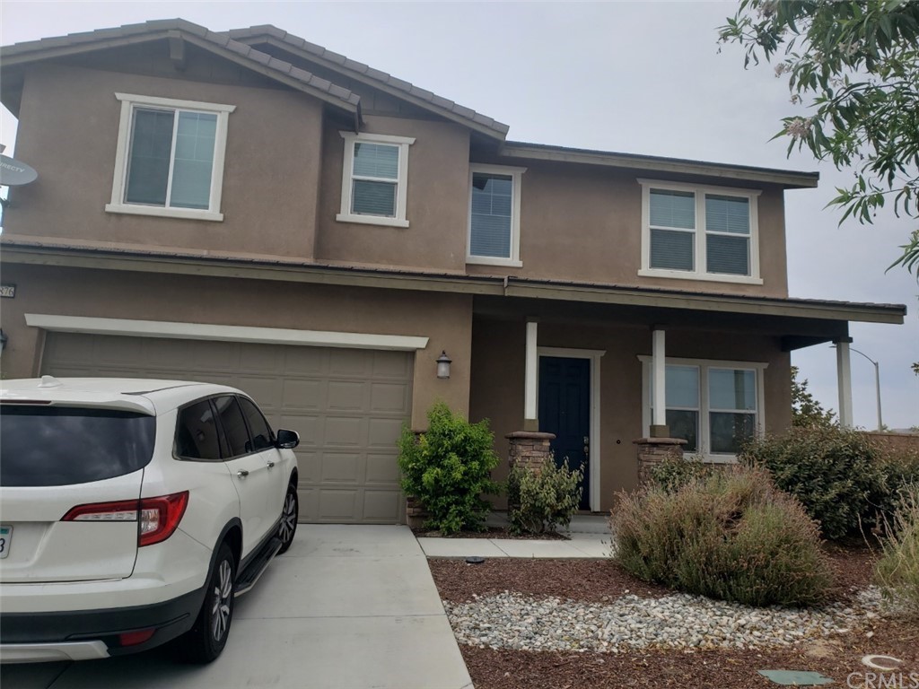 31876 Lace Flower Road Murrieta, CA 92563 - Photo 1 of 1 a car parked in front of a house