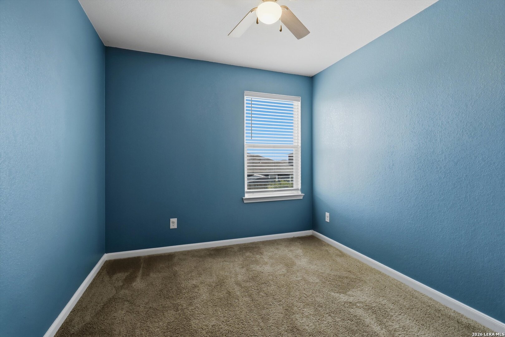 3130 Jackson Converse, TX 78109 - Photo 12 of 22 an empty room with a window