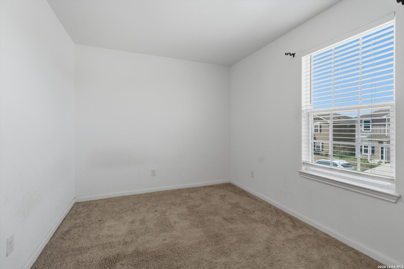 3130 Jackson Converse, TX 78109 - Photo 13 of 22 an empty room with a window