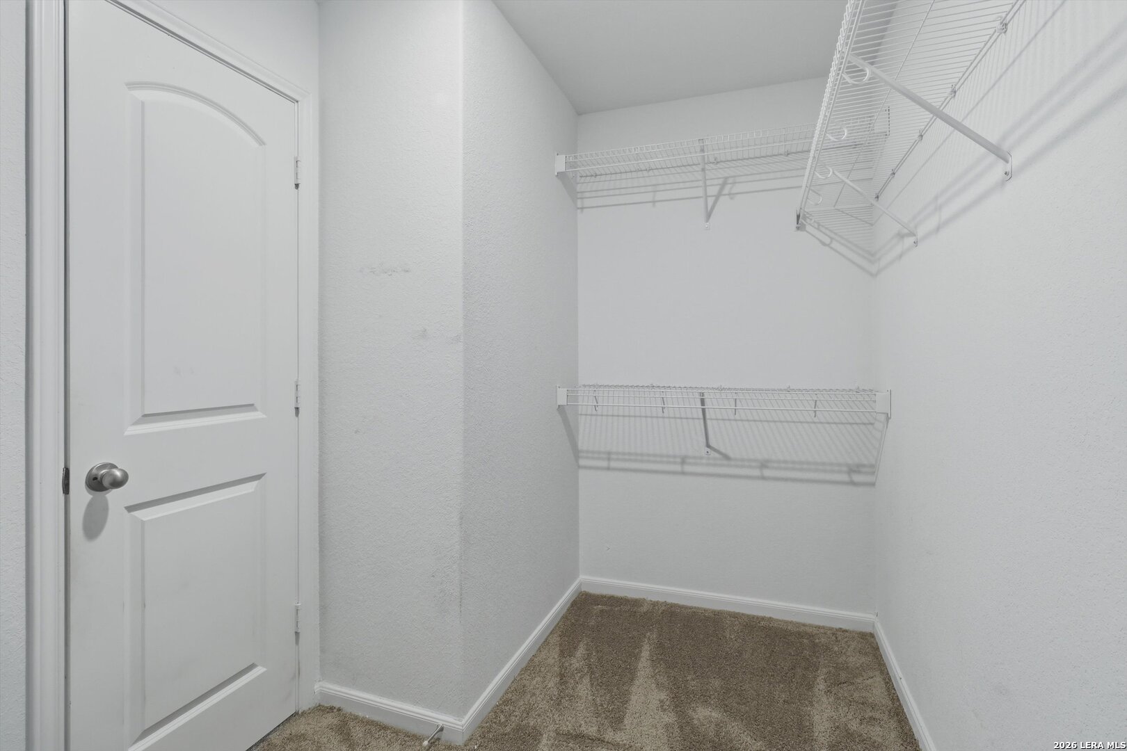 3130 Jackson Converse, TX 78109 - Photo 16 of 22 a view of storage and utility room with racks on the wall