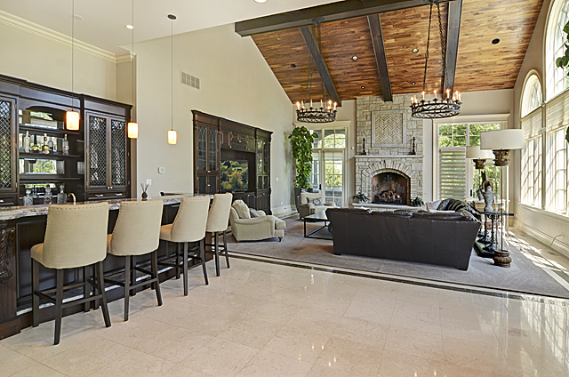3011 Lincoln Road Oak Brook, IL 60523 - Photo 13 of 77 a living room with furniture a fireplace and a chandelier