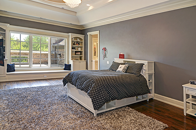 3011 Lincoln Road Oak Brook, IL 60523 - Photo 36 of 77 a bedroom with a bed and a large window