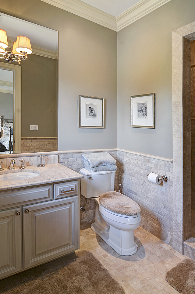 3011 Lincoln Road Oak Brook, IL 60523 - Photo 39 of 77 a bathroom with a toilet sink and mirror