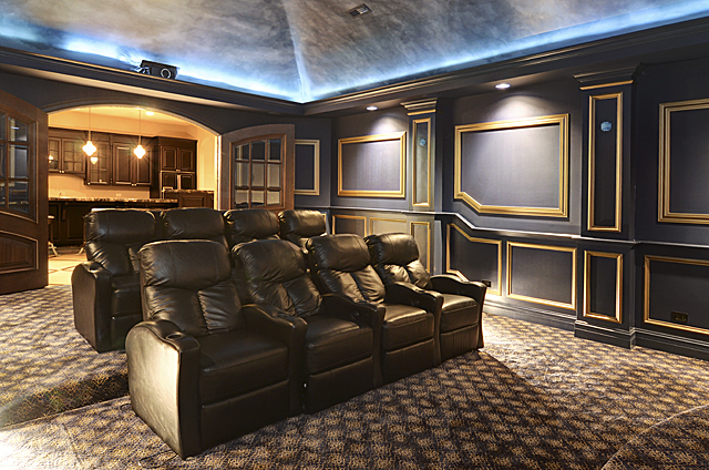3011 Lincoln Road Oak Brook, IL 60523 - Photo 49 of 77 a media room with lots of chairs and a projector screen