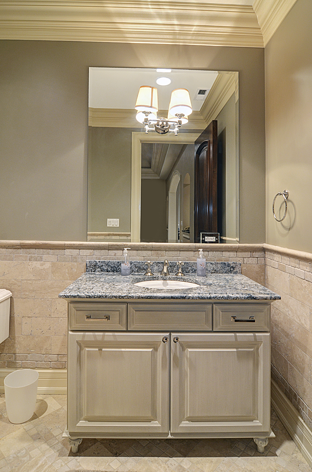 3011 Lincoln Road Oak Brook, IL 60523 - Photo 55 of 77 a bathroom with a granite countertop sink and a mirror