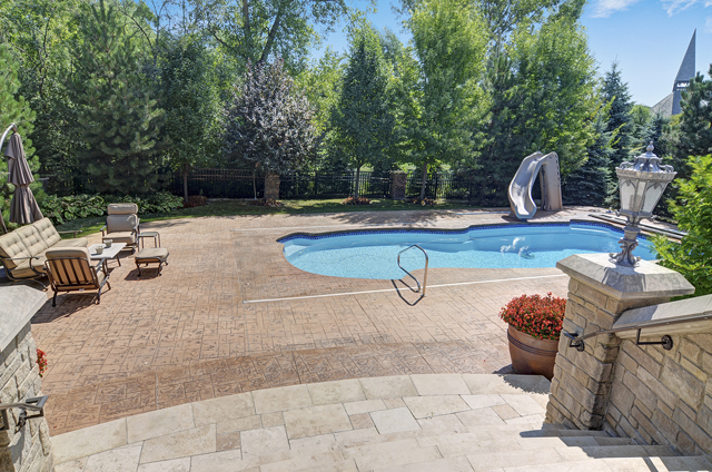 3011 Lincoln Road Oak Brook, IL 60523 - Photo 59 of 77 a view of backyard with swimming pool and outdoor seating