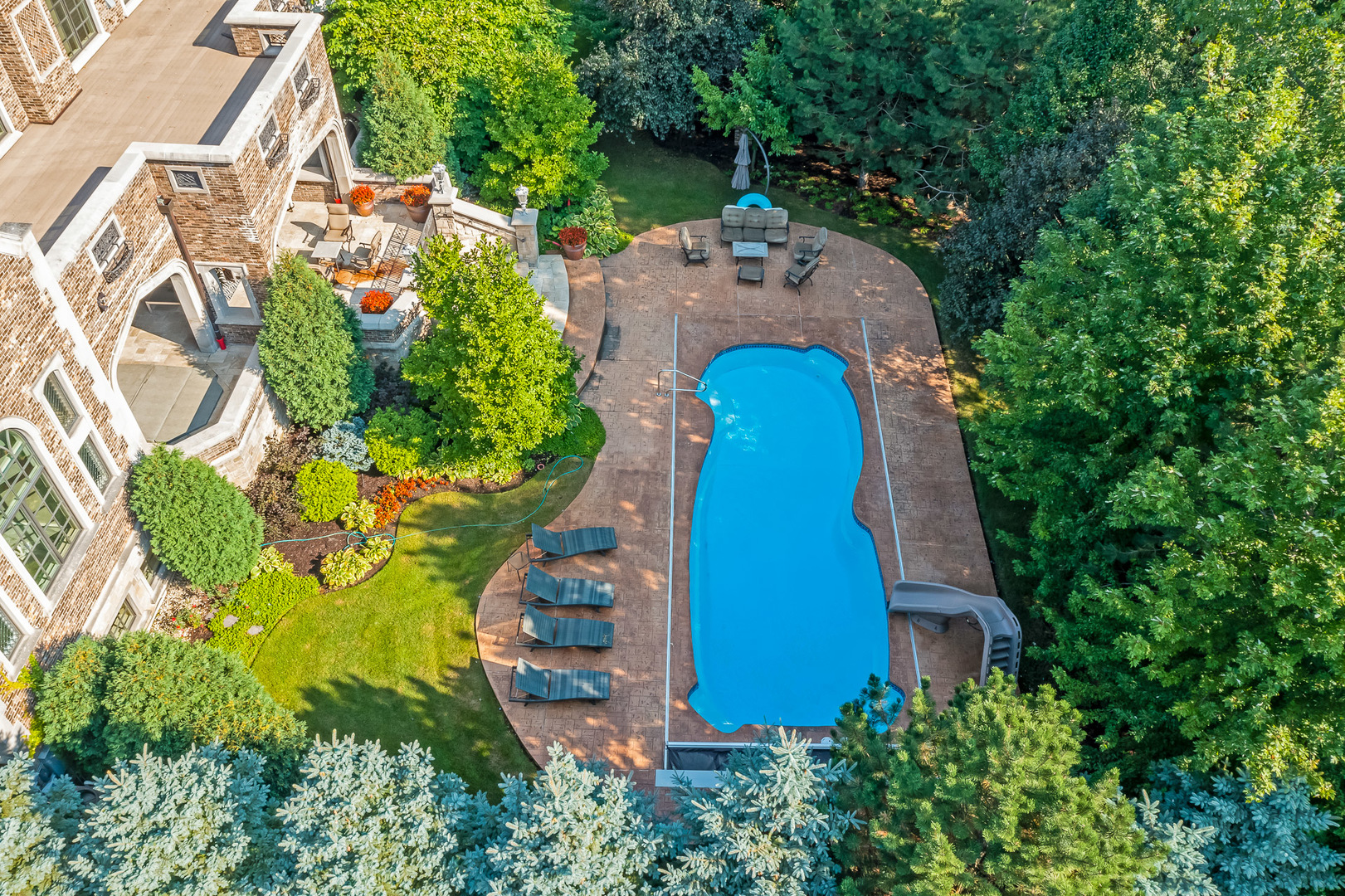 3011 Lincoln Road Oak Brook, IL 60523 - Photo 70 of 77 an aerial view of a house with a yard and plants