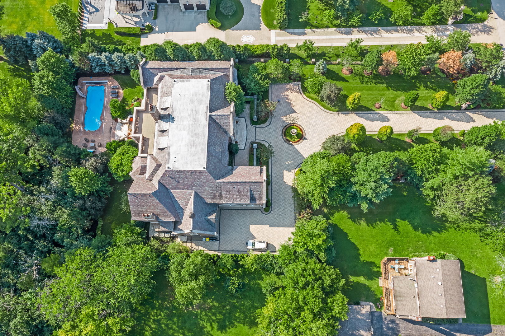 3011 Lincoln Road Oak Brook, IL 60523 - Photo 72 of 77 an aerial view of a house with garden space and street view