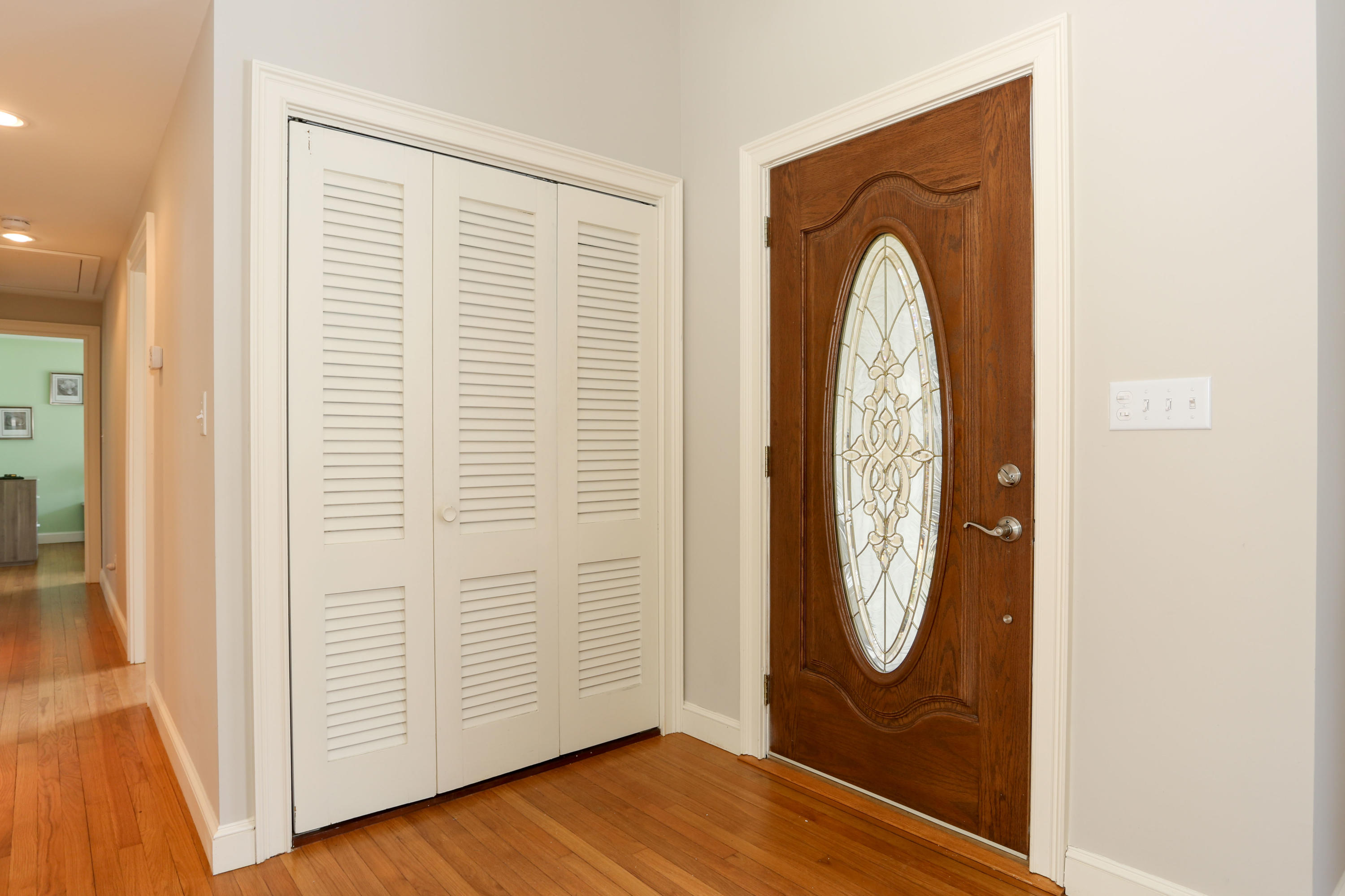 1153 Bumps River Road Centerville, MA 02632 - Photo 5 of 29 a view of front door with wooden floor