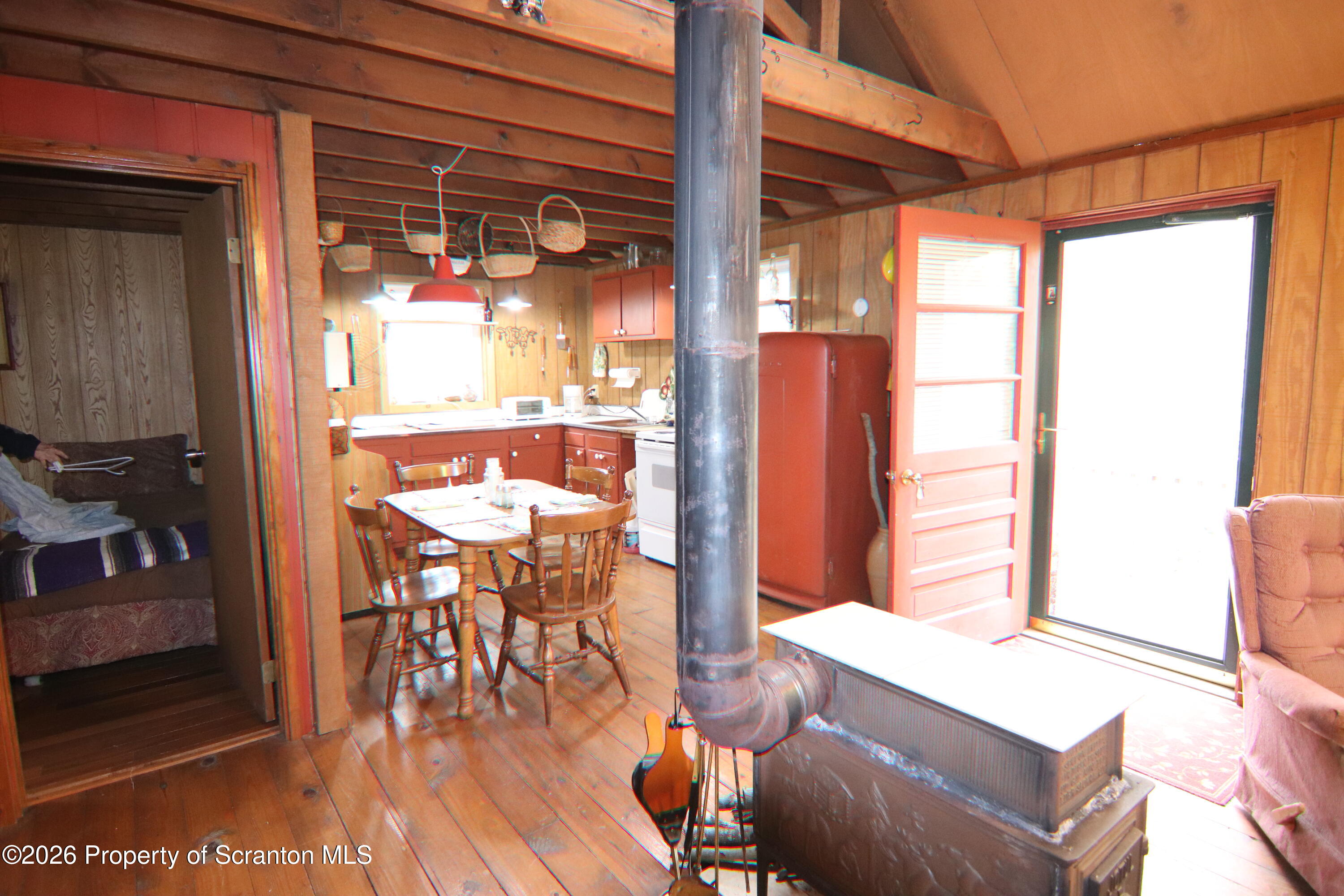 300 Pennsworth Hill Road Meshoppen, PA 18630 - Photo 11 of 38 a dining room with glass top table and chairs