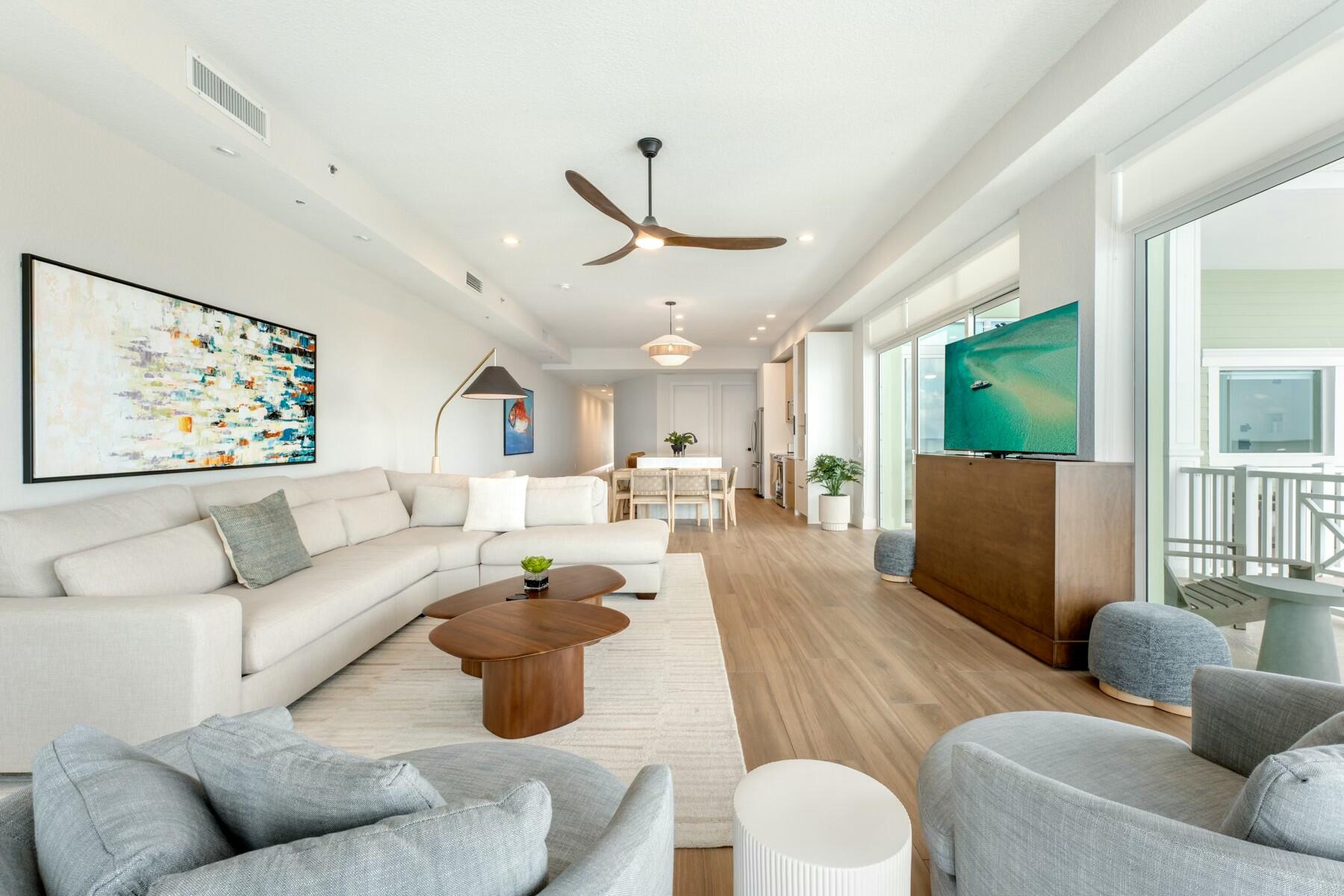 104000 Overseas Highway, Unit 5 Key Largo, FL 33037 - Photo 12 of 60 a living room with furniture or outdoor view and a large window