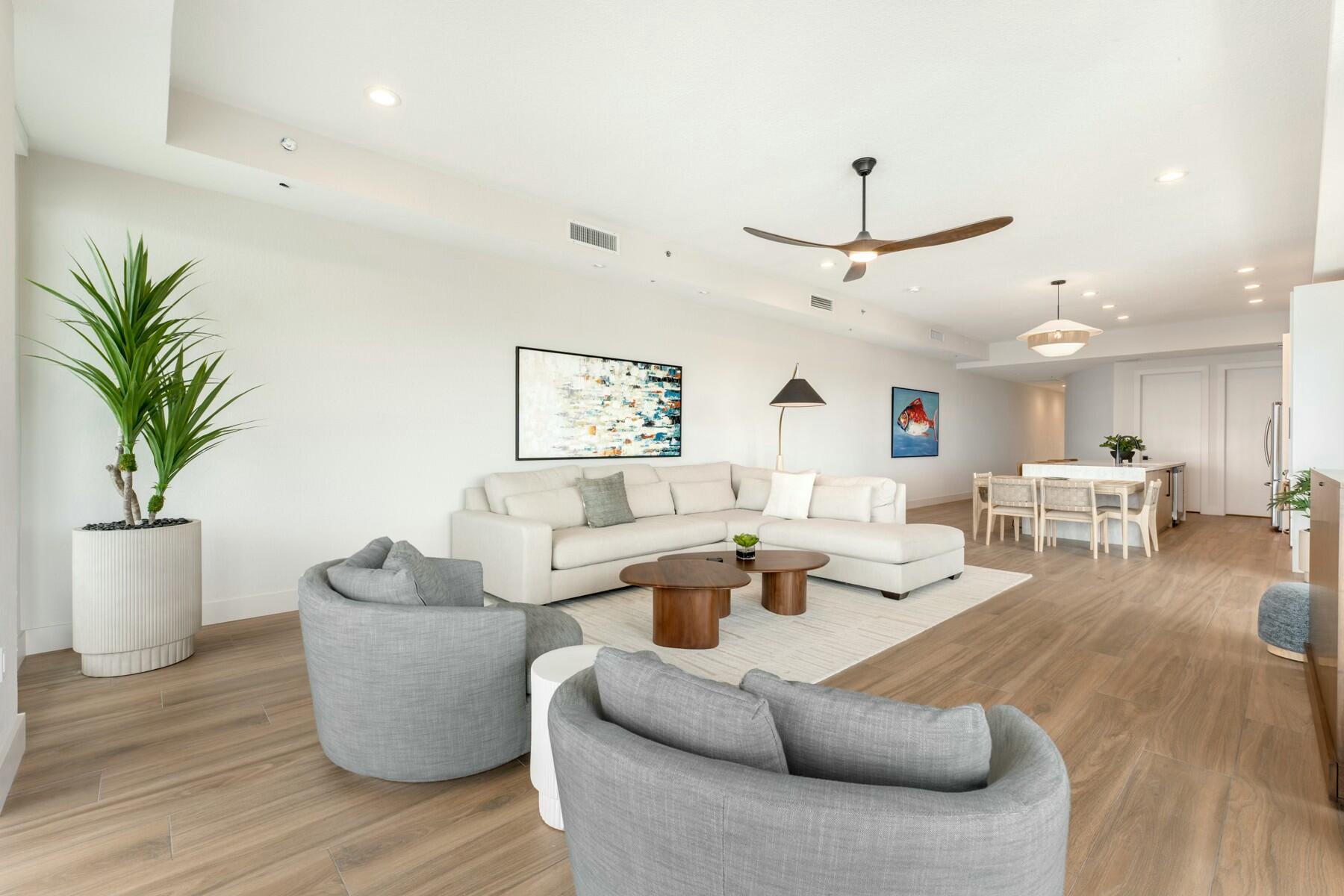 104000 Overseas Highway, Unit 5 Key Largo, FL 33037 - Photo 13 of 60 a living room with furniture or wooden floor and a potted plant