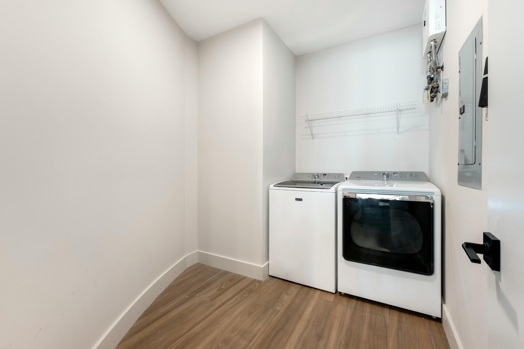 104000 Overseas Highway, Unit 5 Key Largo, FL 33037 - Photo 26 of 60 a utility room with a washer and dryer