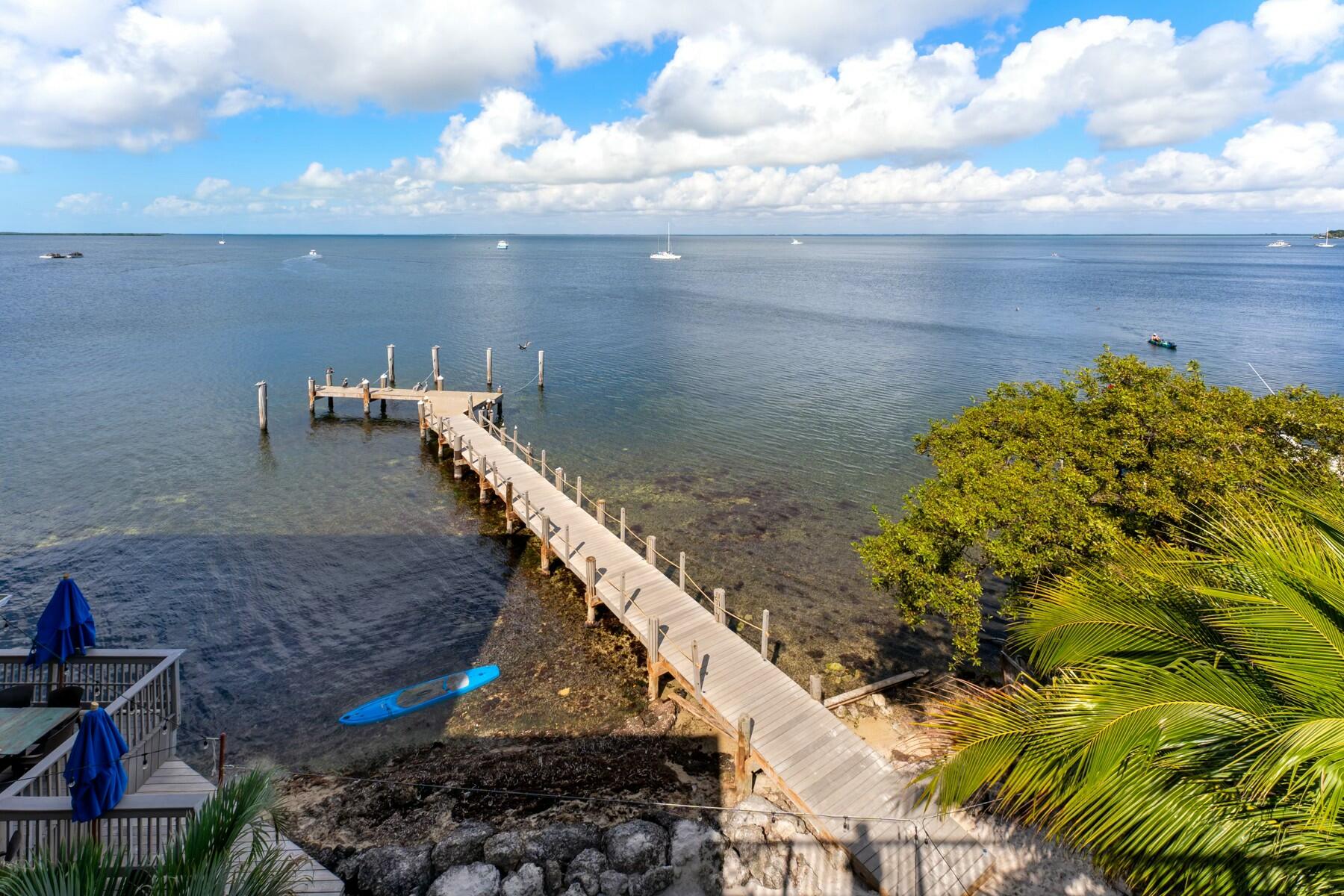 104000 Overseas Highway, Unit 5 Key Largo, FL 33037 - Photo 37 of 60 a view of a backyard