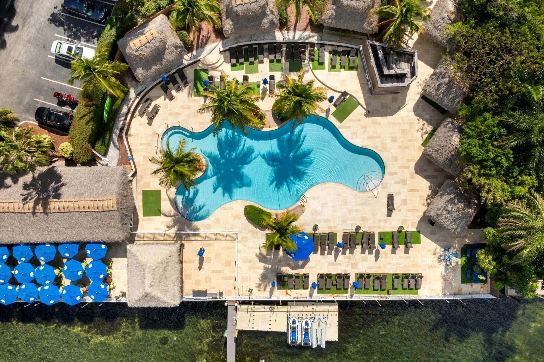 104000 Overseas Highway, Unit 5 Key Largo, FL 33037 - Photo 42 of 60 a front view of a house with a yard