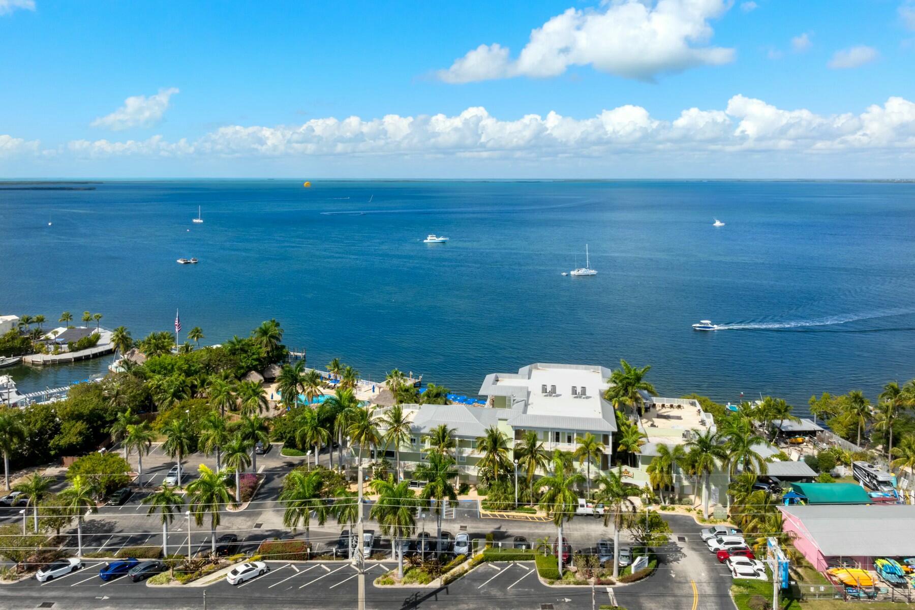 104000 Overseas Highway, Unit 5 Key Largo, FL 33037 - Photo 58 of 60 a view of a city with an ocean view
