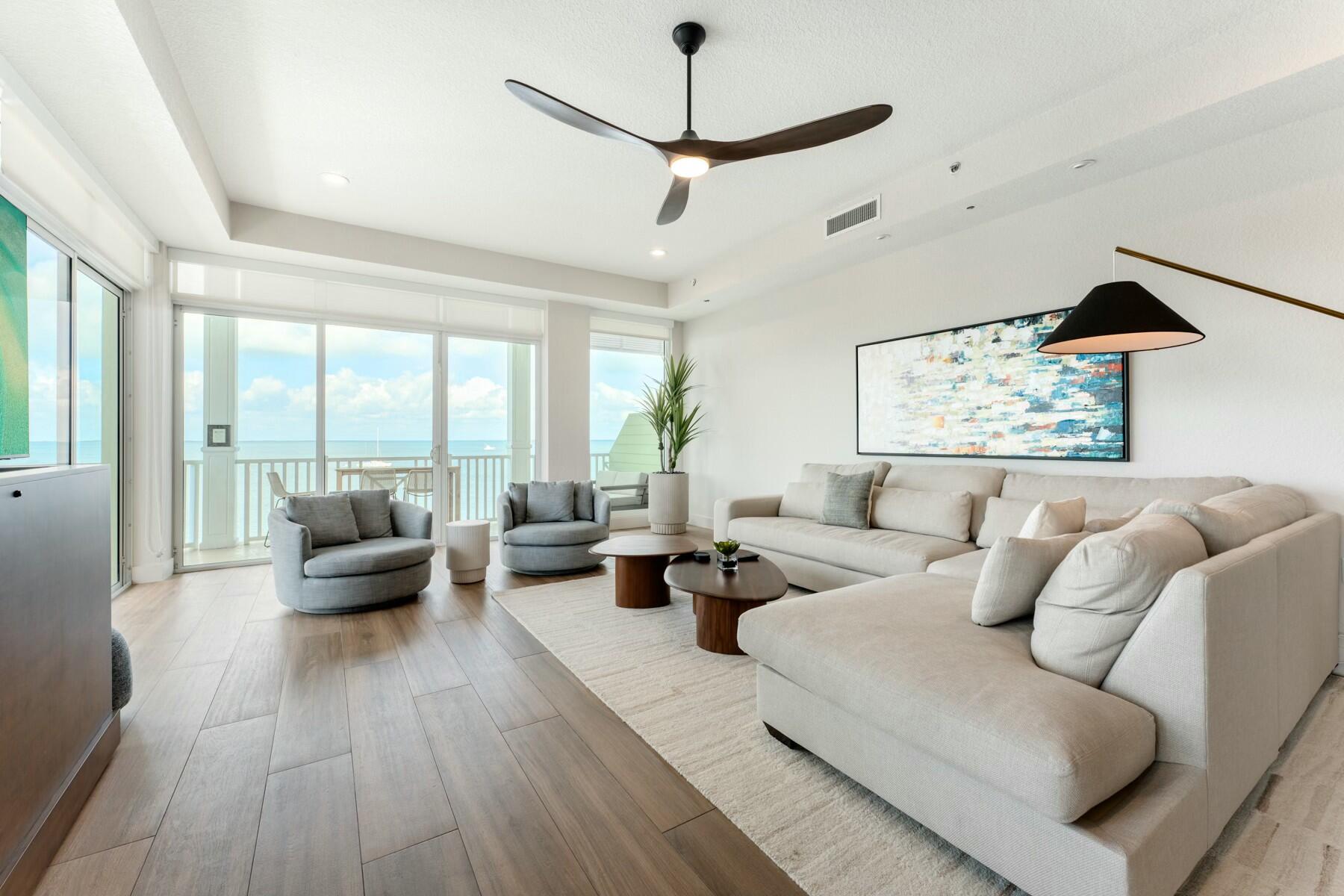 104000 Overseas Highway, Unit 5 Key Largo, FL 33037 - Photo 8 of 60 a living room with furniture and a large window