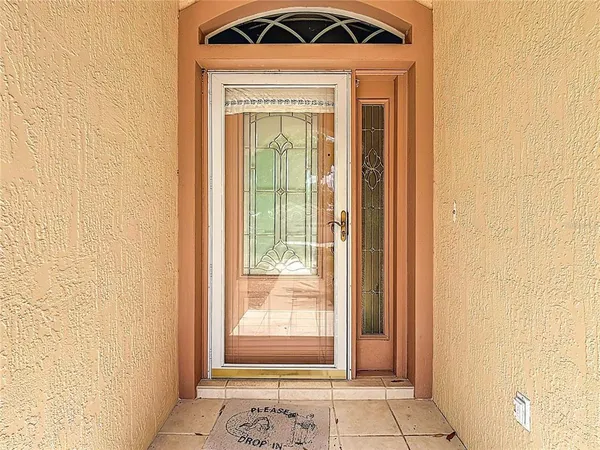 a view of a livingroom with entry way