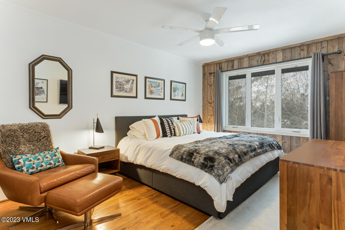 1880 Meadow Ridge Road, Unit 9 Vail, CO 81657 - Photo 13 of 24 a bedroom with a bed couch and window
