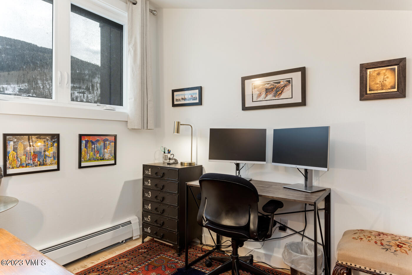 1880 Meadow Ridge Road, Unit 9 Vail, CO 81657 - Photo 21 of 24 a view of a workspace with furniture and a window