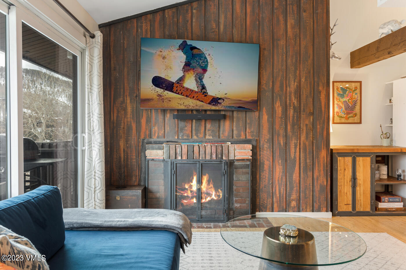 1880 Meadow Ridge Road, Unit 9 Vail, CO 81657 - Photo 3 of 24 a living room with furniture and a fireplace