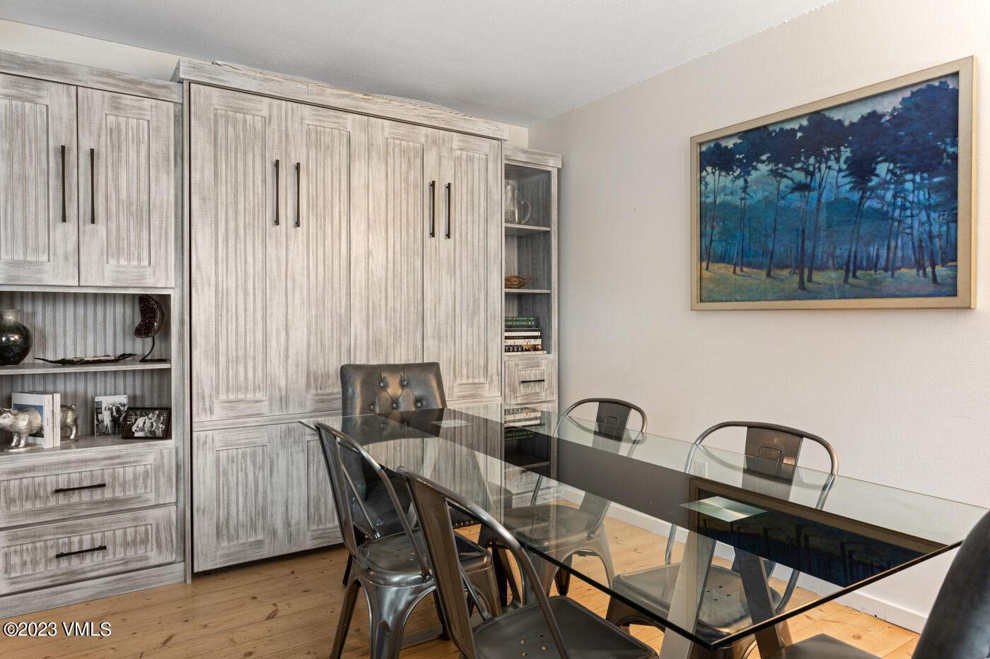1880 Meadow Ridge Road, Unit 9 Vail, CO 81657 - Photo 7 of 24 a view of a dining room with furniture and wooden floor
