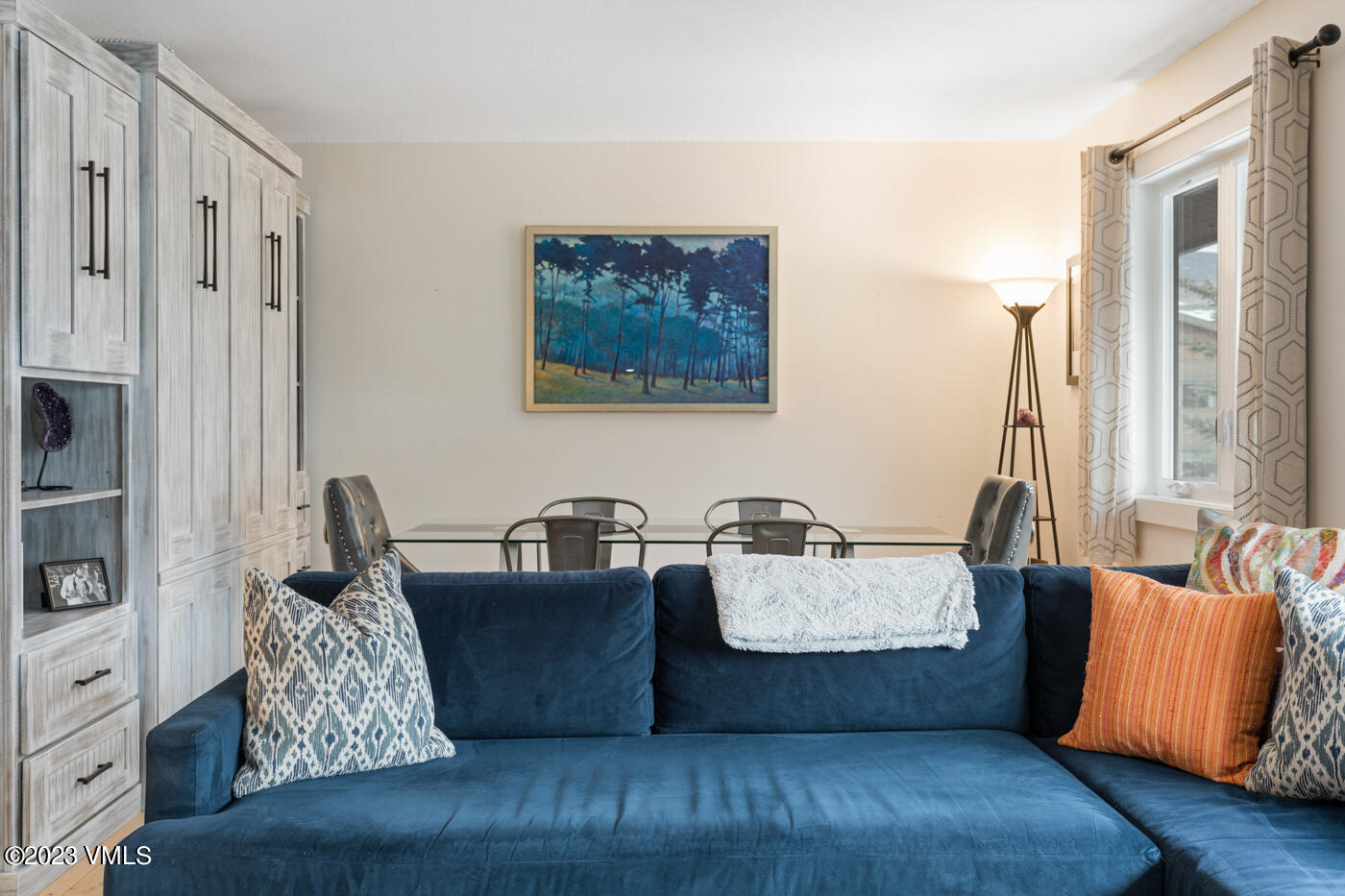 1880 Meadow Ridge Road, Unit 9 Vail, CO 81657 - Photo 9 of 24 a living room with furniture and large window