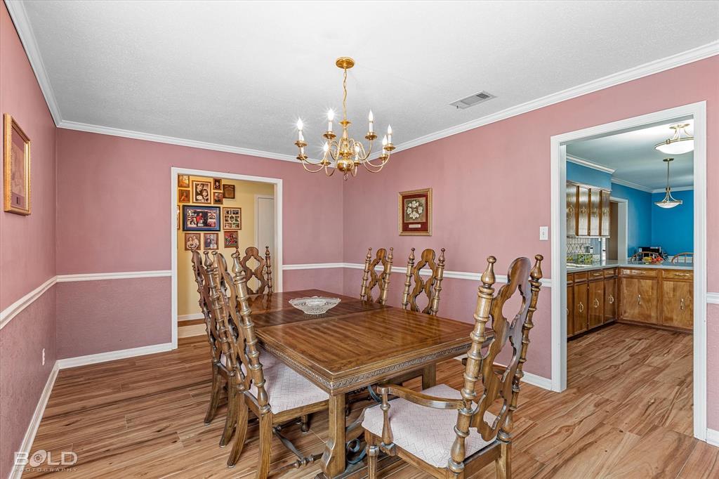 8543 Sac Fox Road Shreveport, LA 71107 - Photo 14 of 35 a dining room with furniture and window