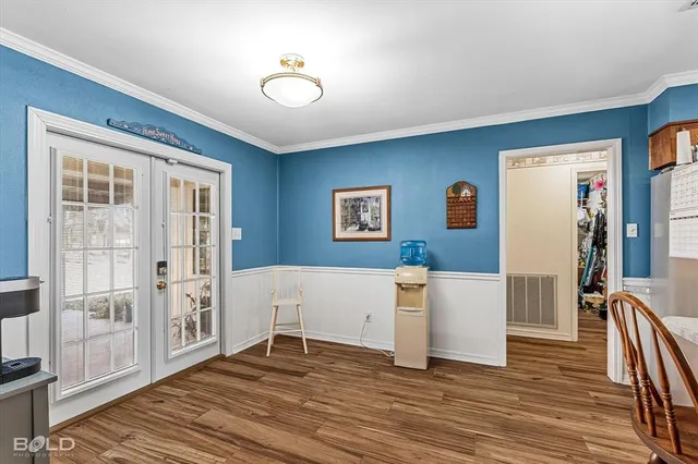a living room with furniture a ceiling fan and a window