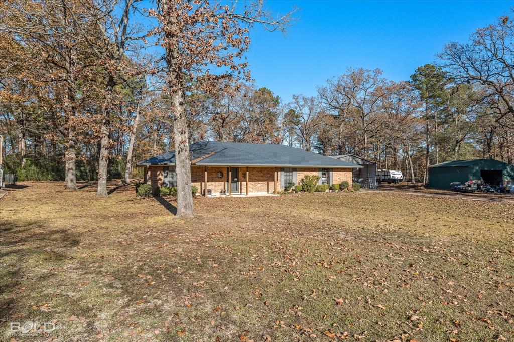8543 Sac Fox Road Shreveport, LA 71107 - Photo 35 of 35 a view of a house with a yard
