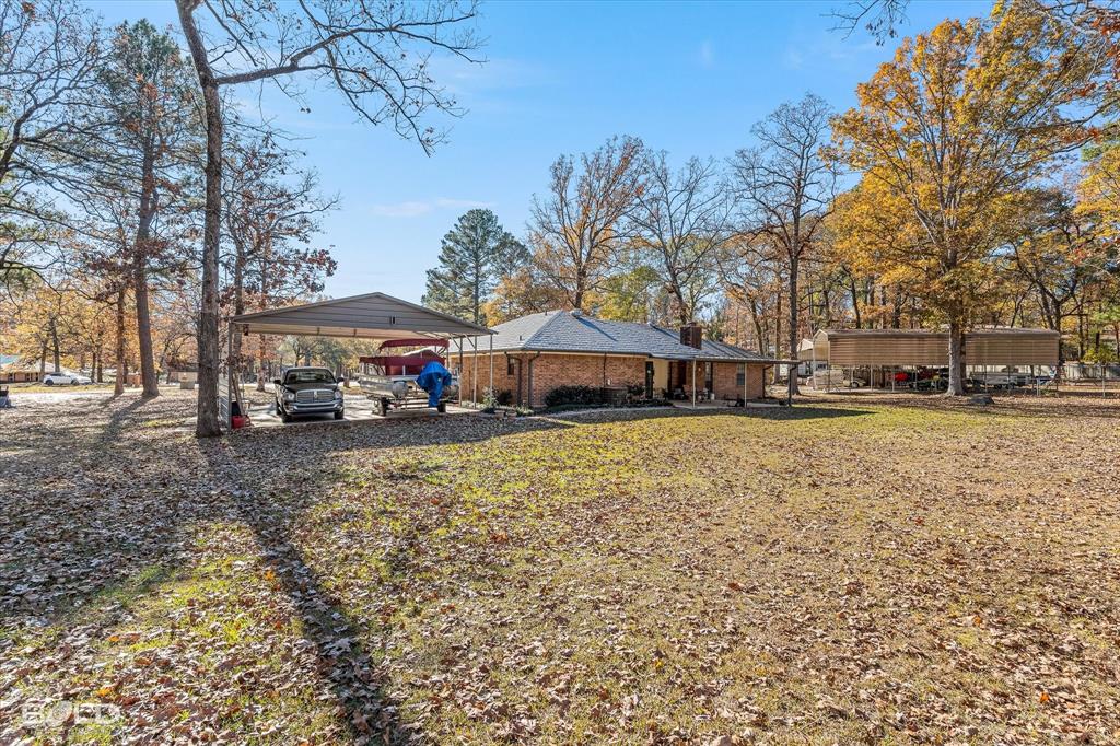 8543 Sac Fox Road Shreveport, LA 71107 - Photo 5 of 35 a house view with a outdoor space