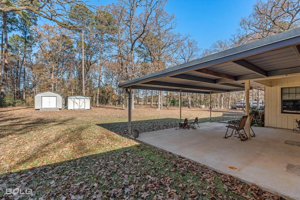8543 Sac Fox Road Shreveport, LA 71107 - Photo 9 of 35 a view of a backyard with sitting area