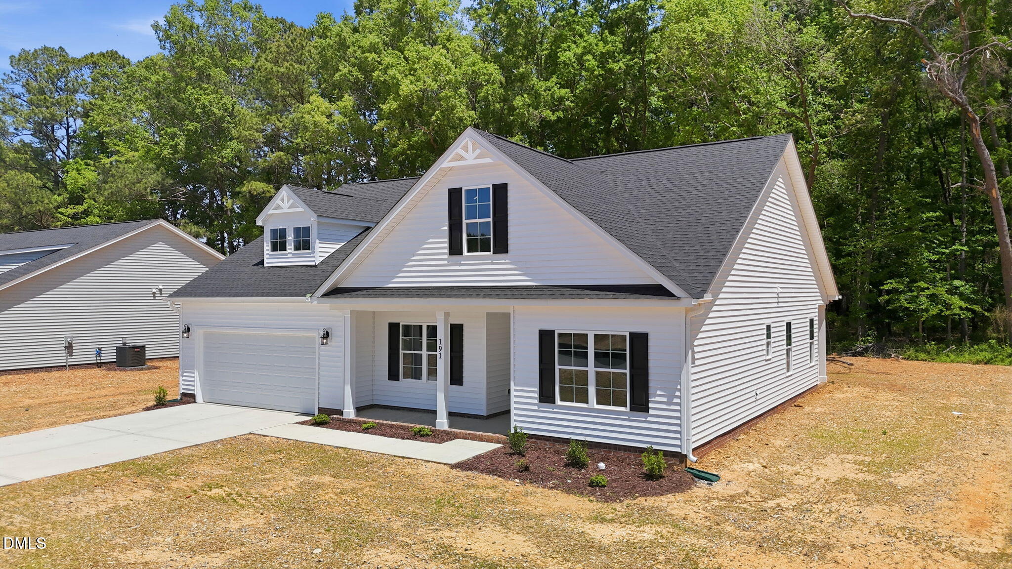 191 Nectar Lane Bunnlevel, NC 28323 - Photo 2 of 35 a house that has a tree in front of it